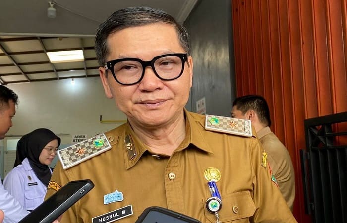 Kepala Dinas Kesehatan Kota Malang, Husnul Muarif, saat diwawancara awak media 2025. (KOMPAS.com/ Putu Ayu Pratama Sugiyo)
